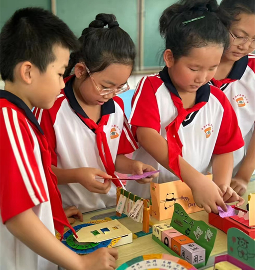 1719210956497819.jpg 元宝山区平矿二小关工委数学节活动照片1_副本.jpg