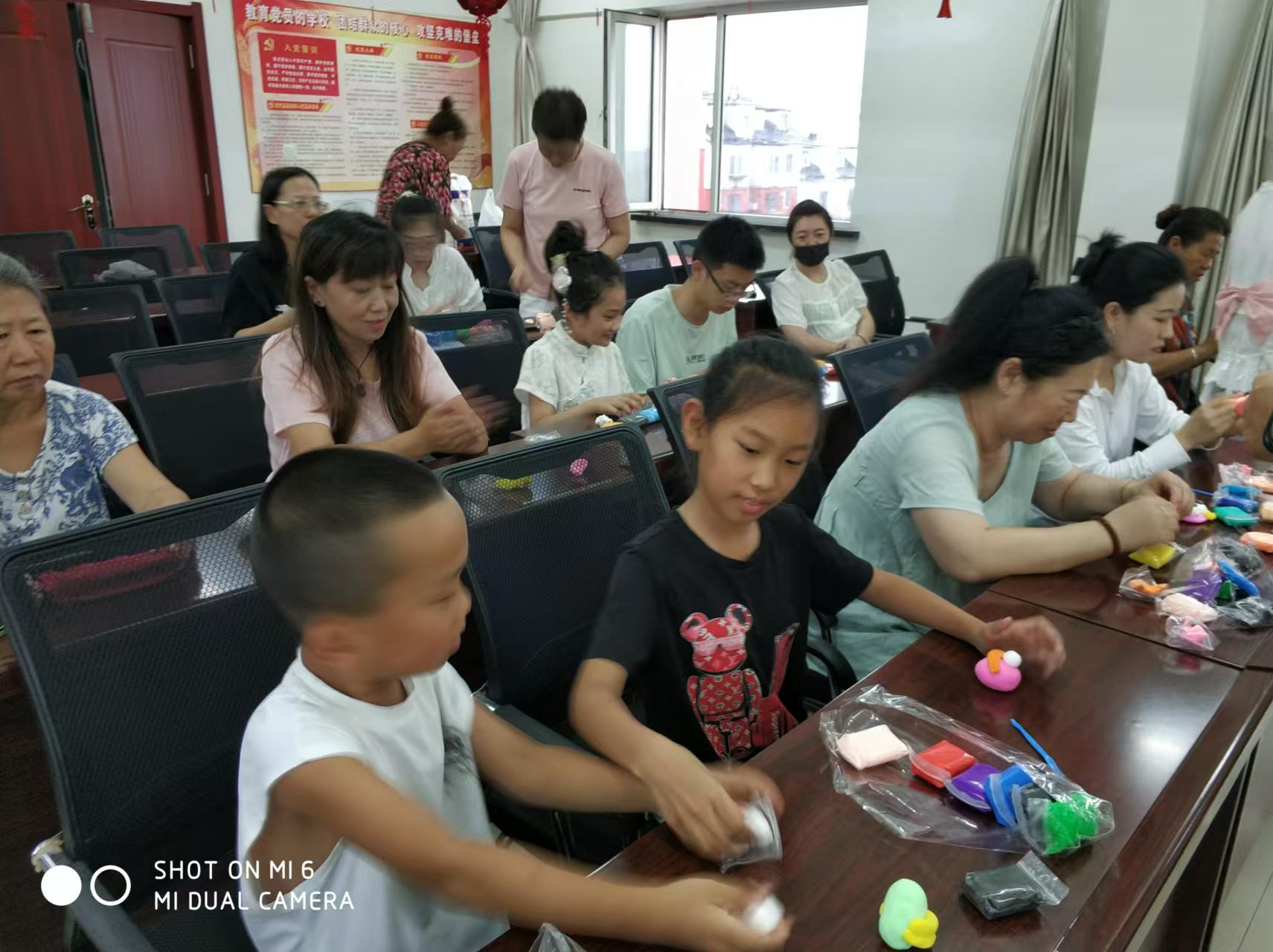 2024.08.02新立社区关工委开展暑假泥塑活动照片之一.jpg