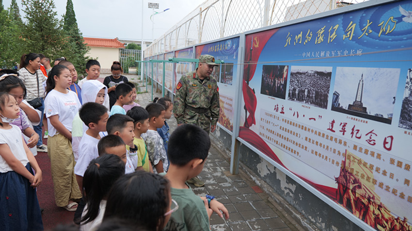 1753778486509423.jpg 元宝山区西城街道阳光社区关工委组织青少年长征式练兵活动照片1_副本.jpg