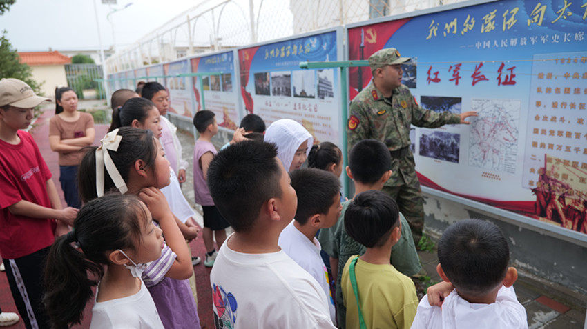 1753778508700312.jpg 元宝山区西城街道阳光社区关工委组织青少年长征式练兵活动照片2_副本.jpg