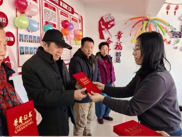 1770181057555730.jpg 彩屯街道关工委照片.jpg