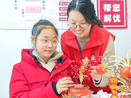 无锡市惠山区长安街道姑里社区关工委开展“祥姑新韵福满溢，柿运新春如意临”活动