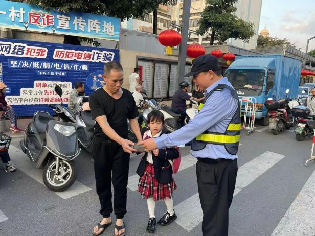1708589462295950.png 2月20日,古镇镇古一村关工委联合古一村治保会在古一小学开展“反邪护苗”宣传活动。.png