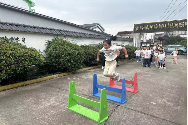 1724897344972106.png 震泽镇龙降桥村假日学校为孩子“托”起多彩夏日.png