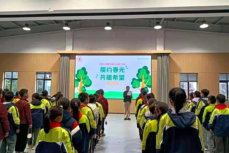 1741828350415659.jpg 江苏省南京市玄武区樱驼花园社区关工委联合开展“樱约春光,共植希望”植树节活动(1).jpg